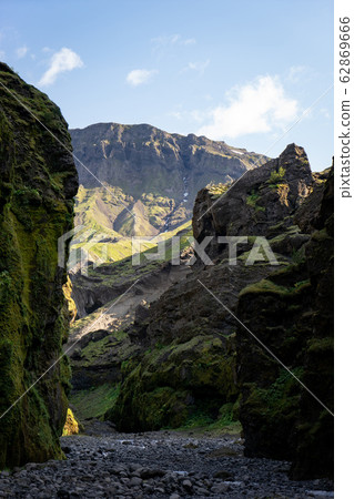 Stakkholtsgja Canyon with blue cloudy sky in Iceland near Posmork Stakkholtsgja Canyon with blue cloudy sky in Iceland near Posmork 62869666