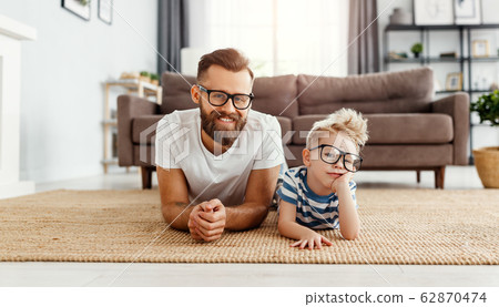 Father's day. Happy funny family son and dad with 62870474