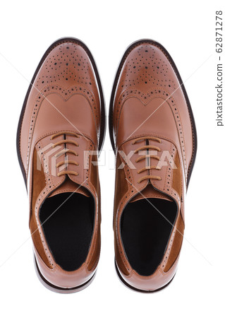 Men's brown shoes isolated on a white background Men's brown shoes isolated on a white background 62871278