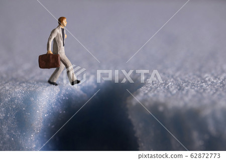 Fallen businessman with hole in ground Fallen businessman with hole in ground 62872773