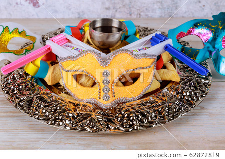 Jewish carnival Purim celebration on hamantaschen 62872819