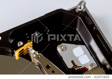 Computer industry in disassembled broken hard disk 62872820