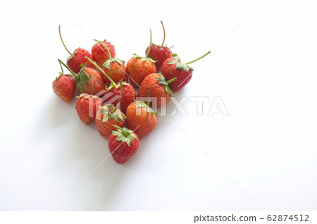 Heart made from strawberry, isolated on white Heart made from strawberry, isolated on white 62874512