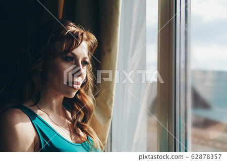 portrait of a woman in profile. The face is covered with hair. The concept of skin care, natural cosmetics, Brazilian blowout, chemistry, painting with henna portrait of a woman in profile. The face is covered with hair. The concept of skin care, natural cosmetics, Brazilian blowout, chemistry, painting with henna 62878357