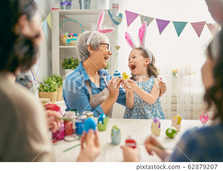 family preparing for Easter family preparing for Easter 62879207