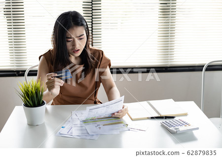Young Asian woman is shocked stress and overthink Young Asian woman is shocked stress and overthink 62879835