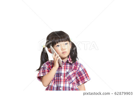 A young girl talking on a smartphone with a serious face. Smartphone, consultation, trouble, phone image 62879903