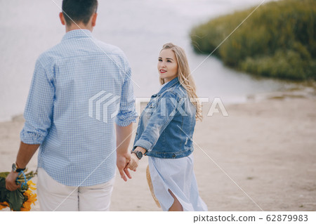 couple near water couple near water 62879983