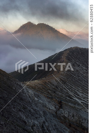 The scenery of the crater of Kawah Ijen with the mist The scenery of the crater of Kawah Ijen with the mist 62880455
