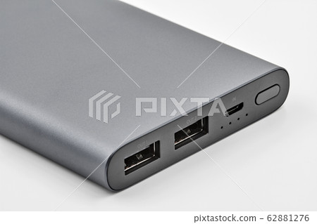 External dark powerbank with two usb outputs on a External dark powerbank with two usb outputs on a 62881276