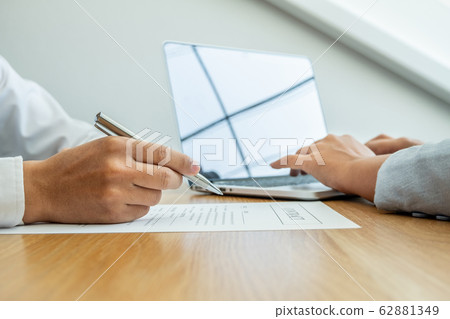 Car dealership provides advice about insurance details and car rental information and delivers the keys after signing the rental contract Car dealership provides advice about insurance details and car rental information and delivers the keys after signing the rental contract 62881349