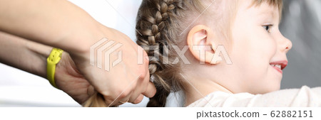 Cute kid playing with toys 62882151