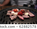People having the Barbecue Yakiniku 62882578