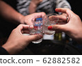 Old friends cheers with Soju in the Yakiniku 62882582