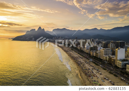 Sunset on the ocean at Rio de Janeiro, Ipanema beach. Brazil 62883135