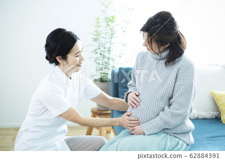 Pregnant women and nurses Pregnant women and nurses 62884391