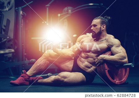 Bodybuilder protein powder after fitness workout 62884728