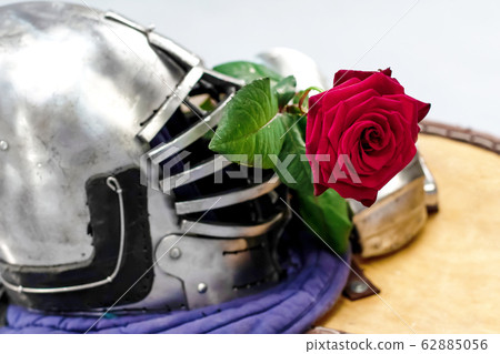 Knight's metal helmet isolated on white Knight's metal helmet isolated on white 62885056
