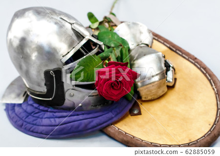 Knight's metal helmet isolated on white Knight's metal helmet isolated on white 62885059