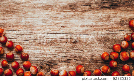 brown wooden background organic snacks hazelnut brown wooden background organic snacks hazelnut 62885325