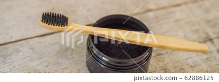 Activated charcoal powder for brushing and whitening teeth. Bamboo eco brush BANNER, LONG FORMAT Activated charcoal powder for brushing and whitening teeth. Bamboo eco brush BANNER, LONG FORMAT 62886125