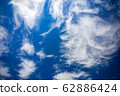 blue sky and white clouds 62886424
