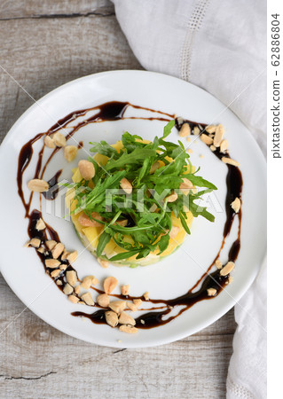 Salad with avocado, mango and mozzarella 62886804