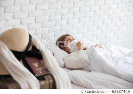 sick woman wearing face protection mask sick woman wearing face protection mask 62887469
