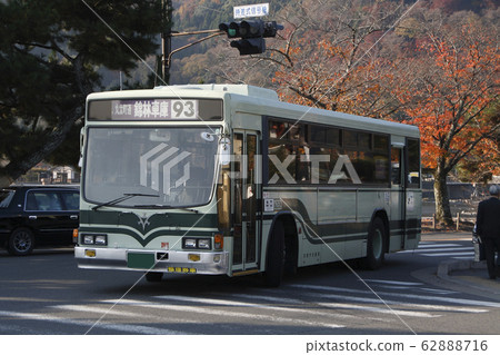 Kyoto City Bus (Route 93/Cubic) going to Arashiyama and Togetsukyo Bridge in autumn Kyoto City Bus (Route 93/Cubic) going to Arashiyama and Togetsukyo Bridge in autumn 62888716