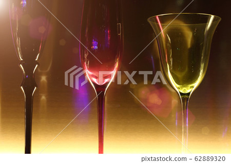 empty bottles and wine glass decorative on backlit empty bottles and wine glass decorative on backlit 62889320