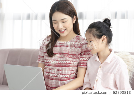 Mom and daughter at home 62890818