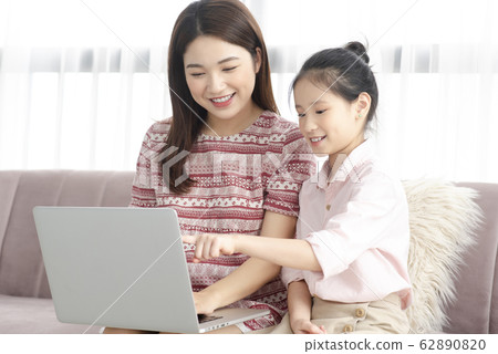 Mom and daughter at home 62890820