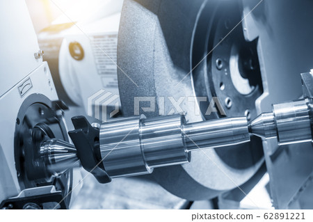 The metal shaft parts on cylindrical grinding machine. The metal shaft parts on cylindrical grinding machine. 62891221