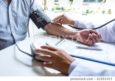 Doctor using stethoscope checking measuring 62891453
