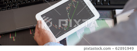 Businessman broker Analyzing finance data graphs Businessman broker Analyzing finance data graphs 62891949
