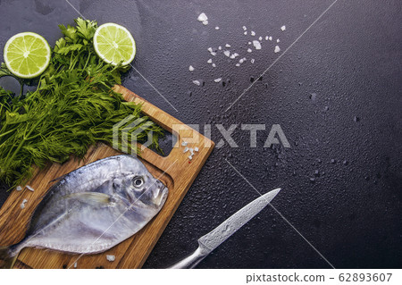 Fresh fish (Vomer or Selene setapinnis ) lay on 62893607