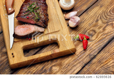 Overhead view of a portion of juicy grilled beef 62893616