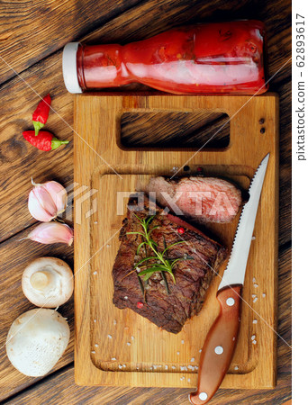 Overhead view of a portion of juicy grilled beef 62893617