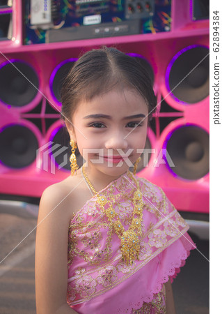 Asian little girl in traditional thai dress  62894384