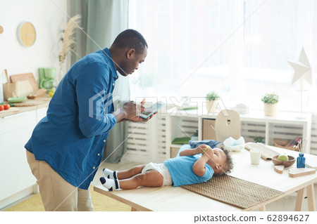 Confused Father Calling Wife 62894627