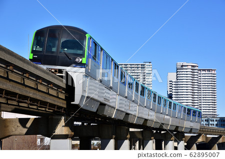 Tokyo monorail going down Keihin canal 62895007