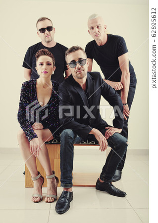 Musicians posing for album cover Musicians posing for album cover 62895612