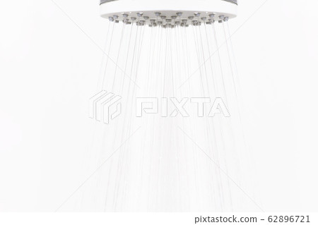 Water jets from white plastic shower head. Water jets from white plastic shower head. 62896721