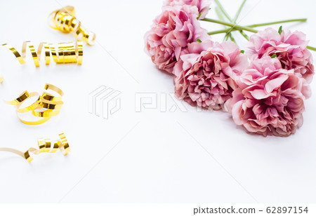 White background with peony flowers and confetti, 62897154