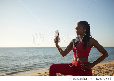 Sportswoman taking selfie Sportswoman taking selfie 62897351