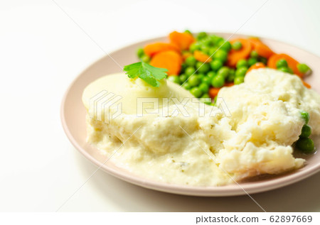 Cod fillet with a creamy cheese sauce, with mashed Cod fillet with a creamy cheese sauce, with mashed 62897669