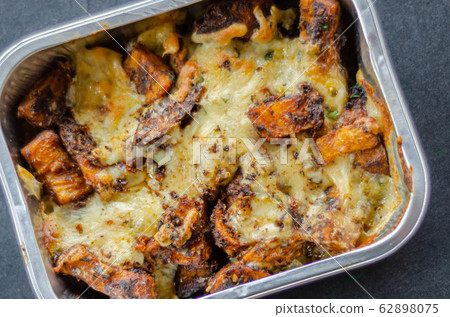 Fried potato fries coated topped with mature Fried potato fries coated topped with mature 62898075