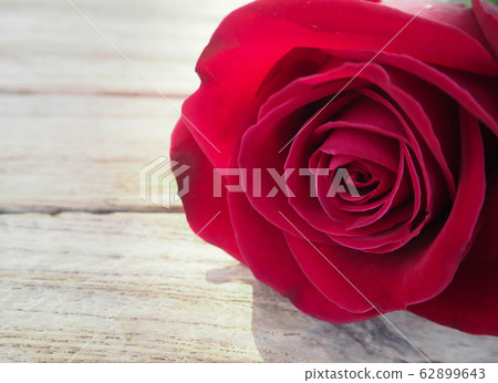 red rose on wooden table for background, red rose on wooden table for background, 62899643