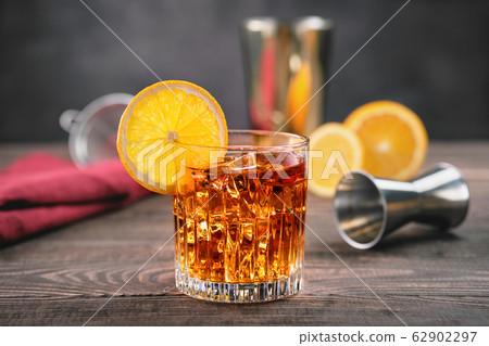 Cocktail with brandy and orange bitter 62902297