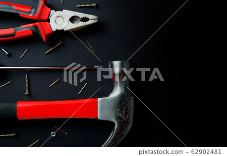 Different construction tools. Maintenance and reparing concept. Place for text, flat lay. Different construction tools. Maintenance and reparing concept. Place for text, flat lay. 62902481